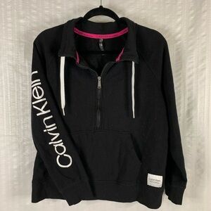 Calvin Klein Performance half zipped fleece on black with pick accents in size L